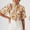 Shirt In White With Rust Floral